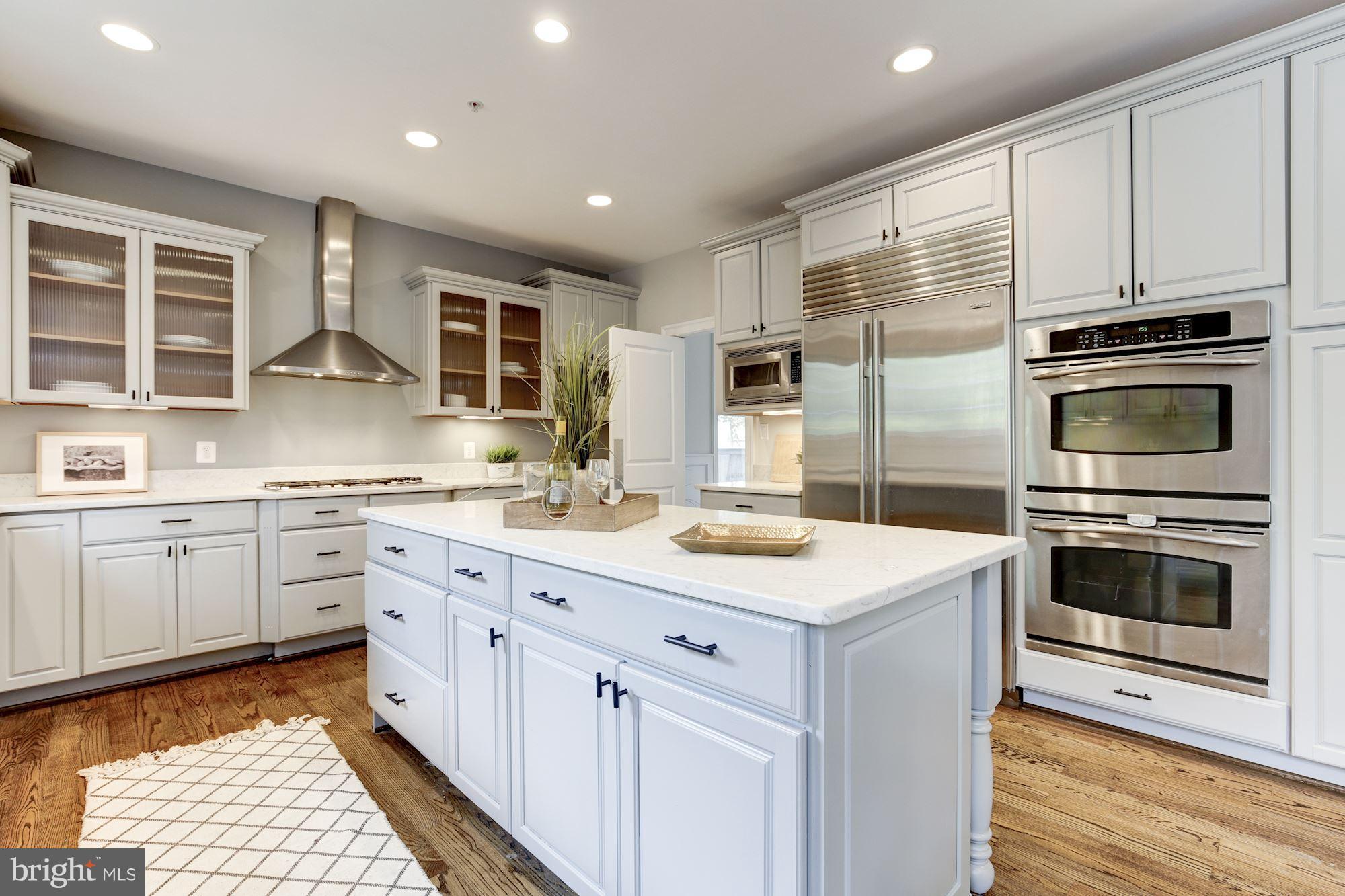 4616 Maple Avenue Bethesda, MD 20814 - Photo 5 of 30 Kitchen offers double oven and center island