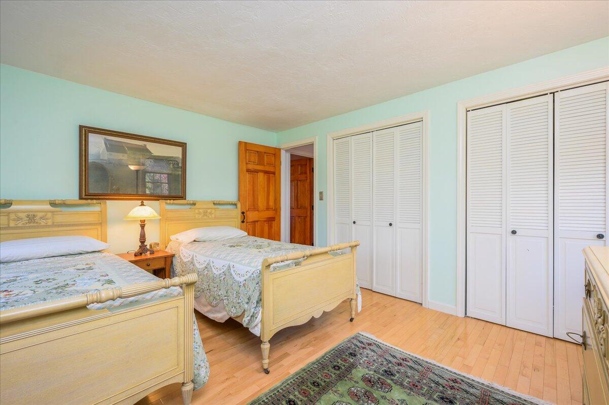 4 Faunce Mountain Road Sandwich, MA 02563 - Photo 19 of 32 a bedroom with a bed and a dresser