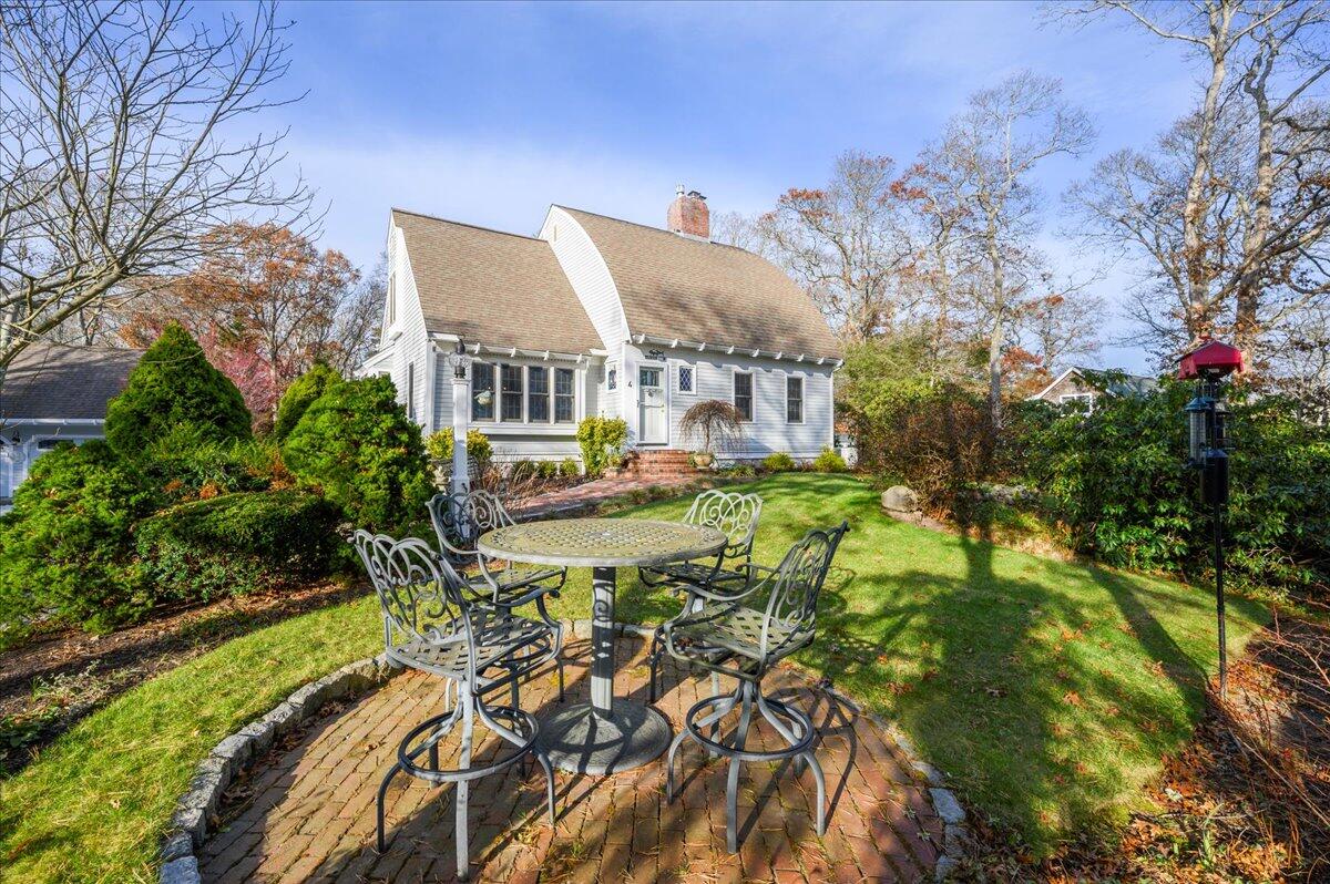 4 Faunce Mountain Road Sandwich, MA 02563 - Photo 2 of 32 a front view of house along with trees and trees