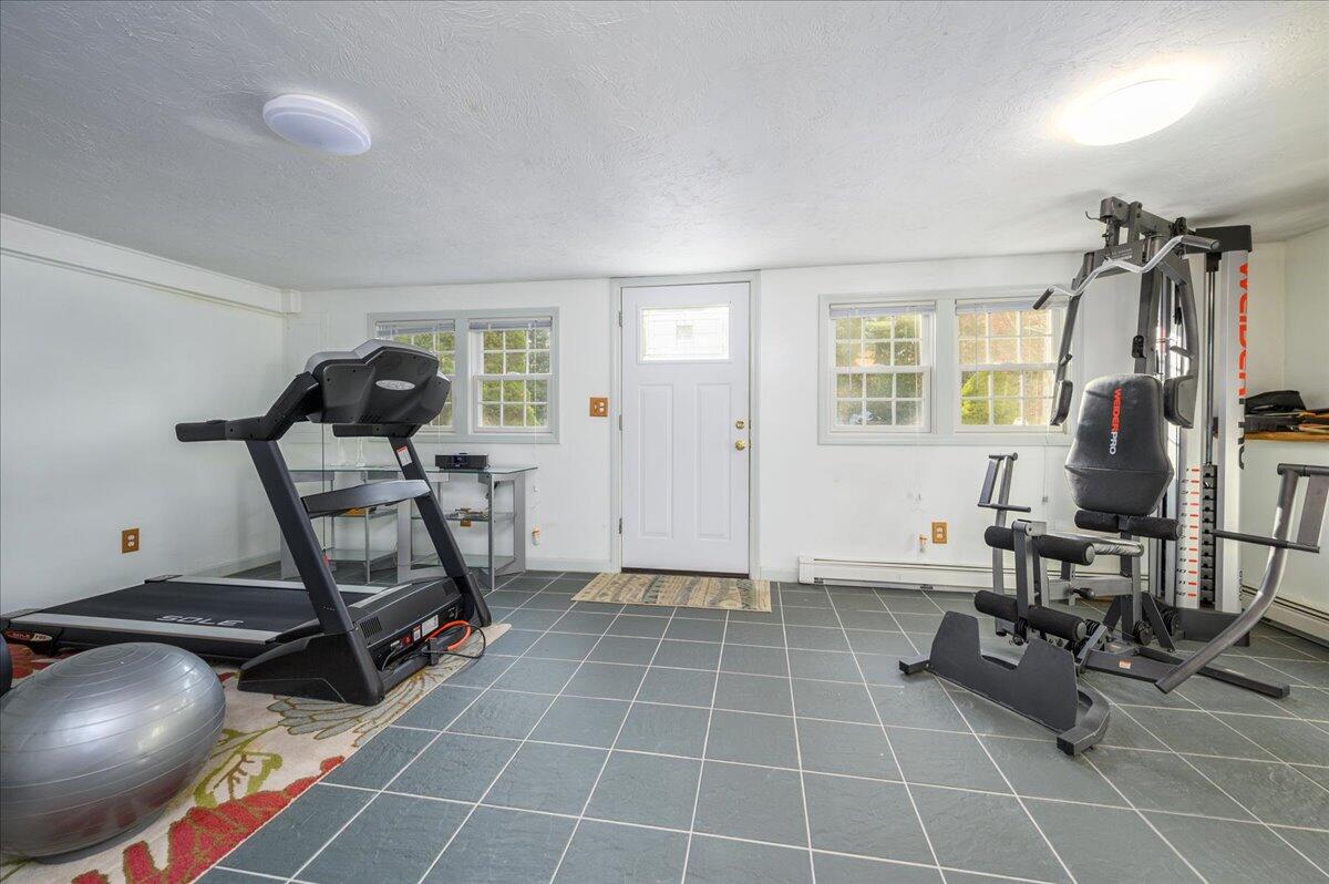 4 Faunce Mountain Road Sandwich, MA 02563 - Photo 22 of 32 a room with gym equipment and windows