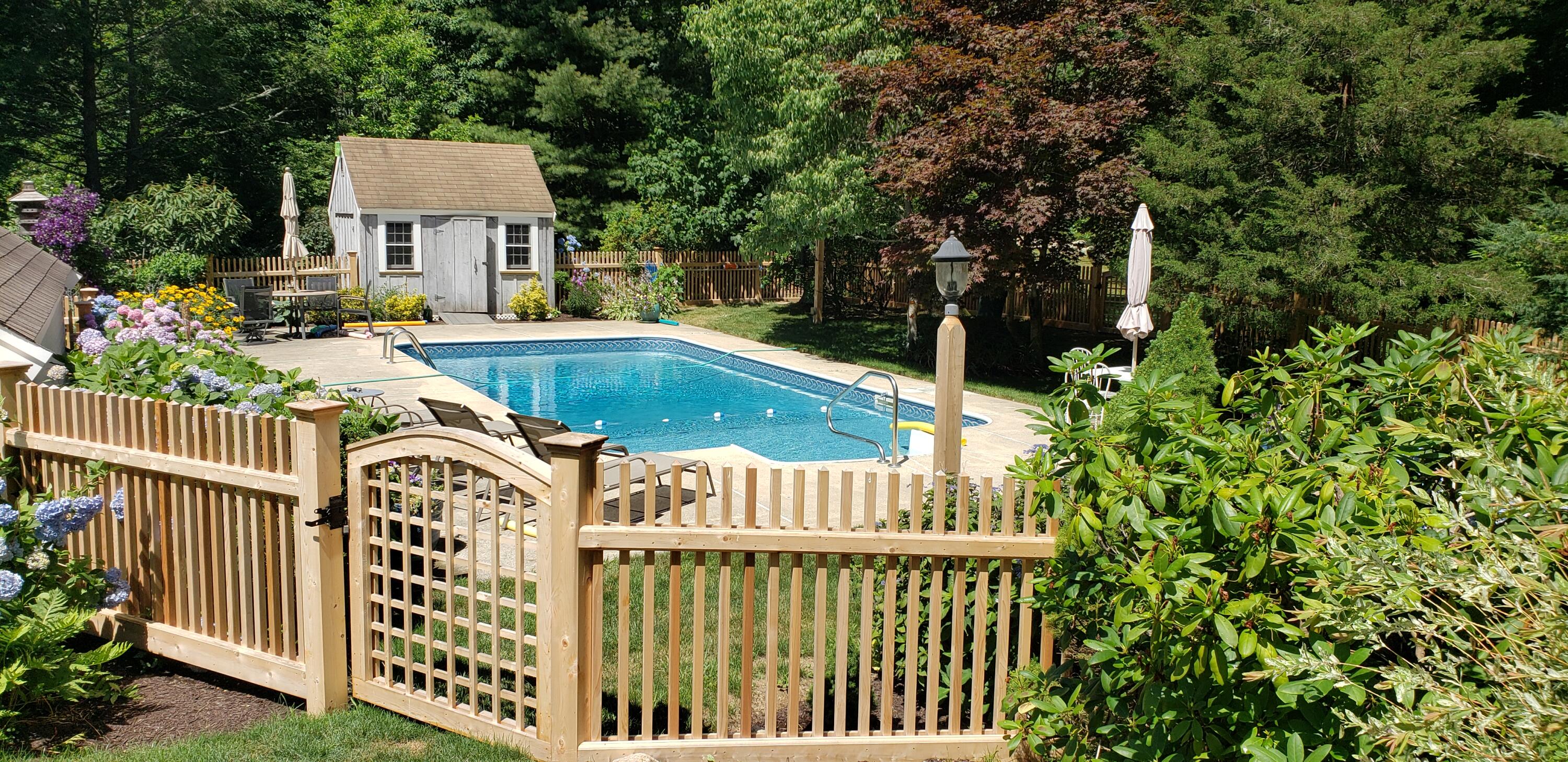4 Faunce Mountain Road Sandwich, MA 02563 - Photo 27 of 32 a view of a house with wooden fence