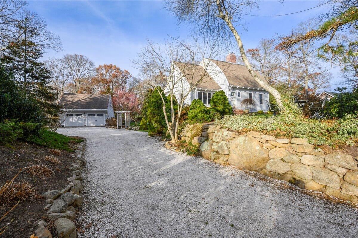 4 Faunce Mountain Road Sandwich, MA 02563 - Photo 29 of 32 a view of a yard with an trees