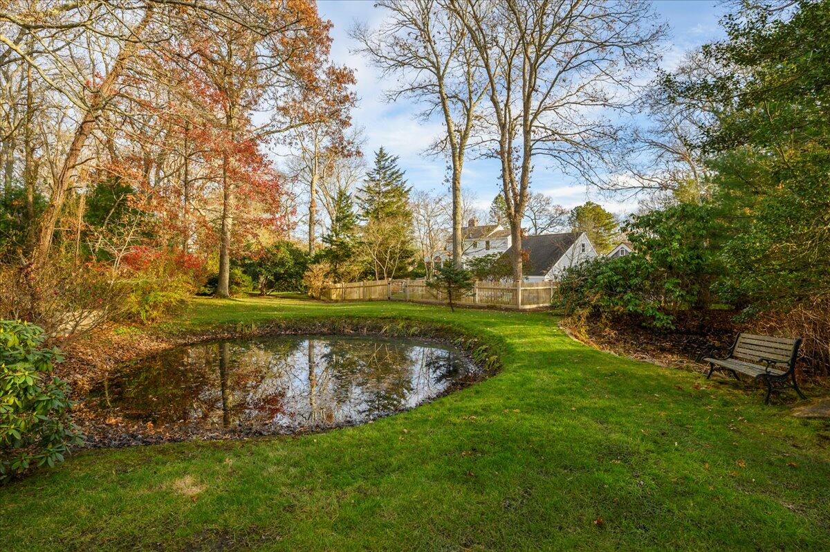4 Faunce Mountain Road Sandwich, MA 02563 - Photo 32 of 32 a view of a golf course with a lake