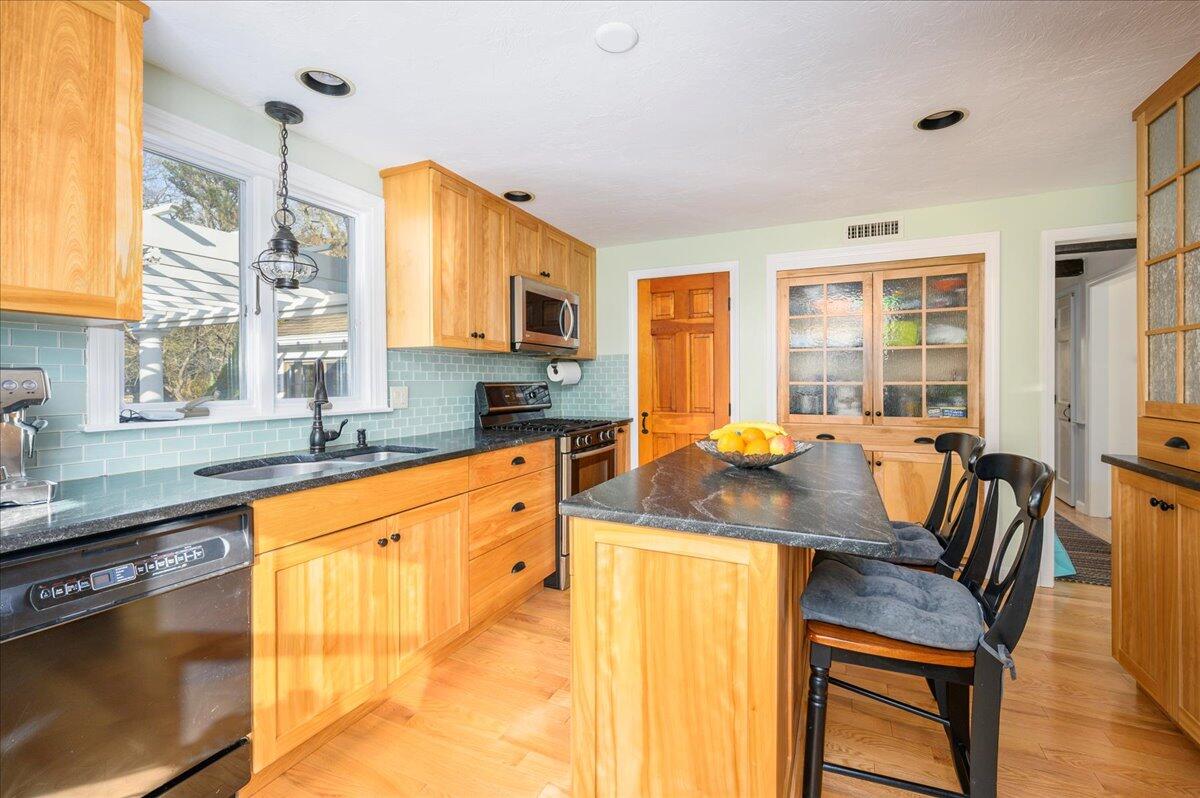 4 Faunce Mountain Road Sandwich, MA 02563 - Photo 6 of 32 a view of a a dining room with furniture window and wooden floor