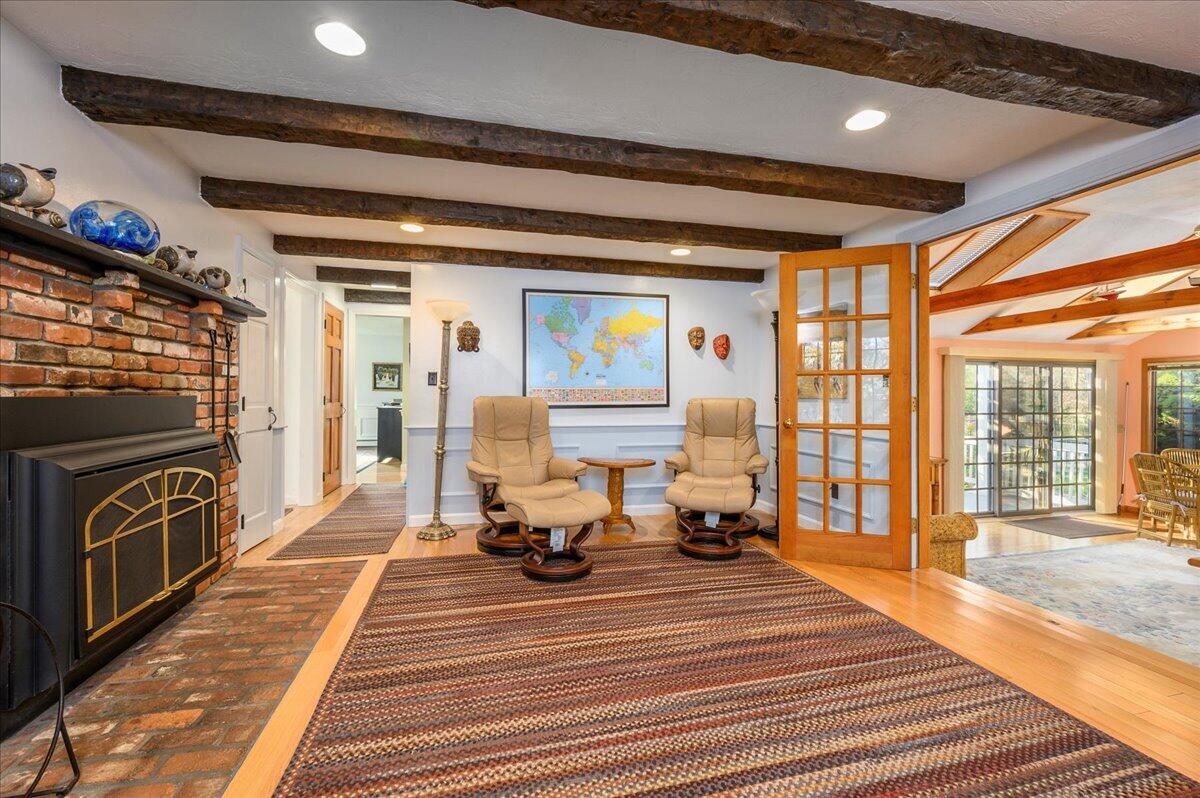 4 Faunce Mountain Road Sandwich, MA 02563 - Photo 9 of 32 a lobby with furniture and a fireplace