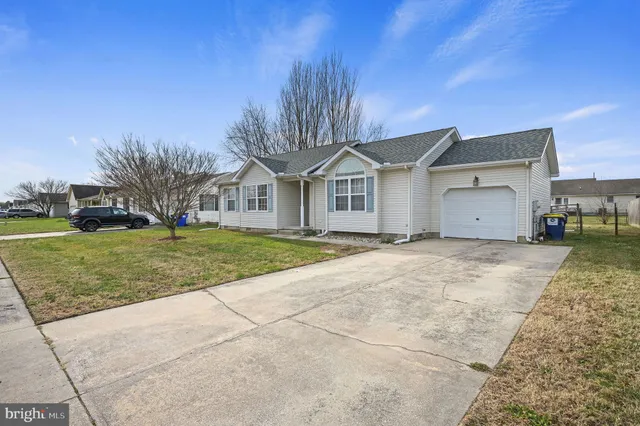 a view of large house with a yard
