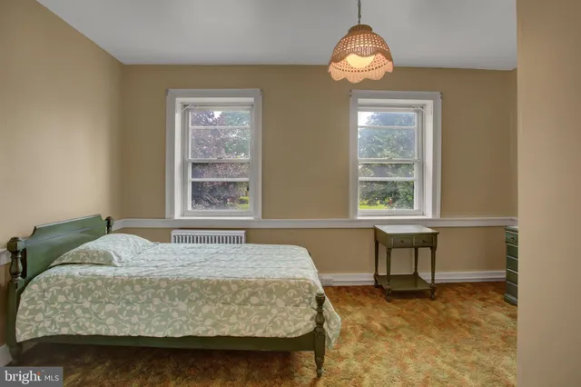 a bathroom with a sink and a window