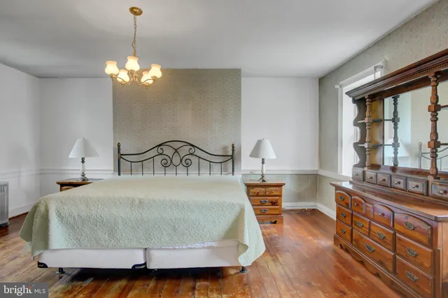 a room with gym equipment and a mirror