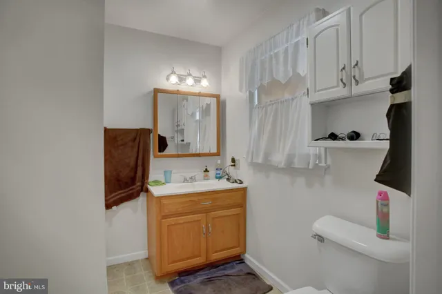 a view of a garden with an outdoor seating