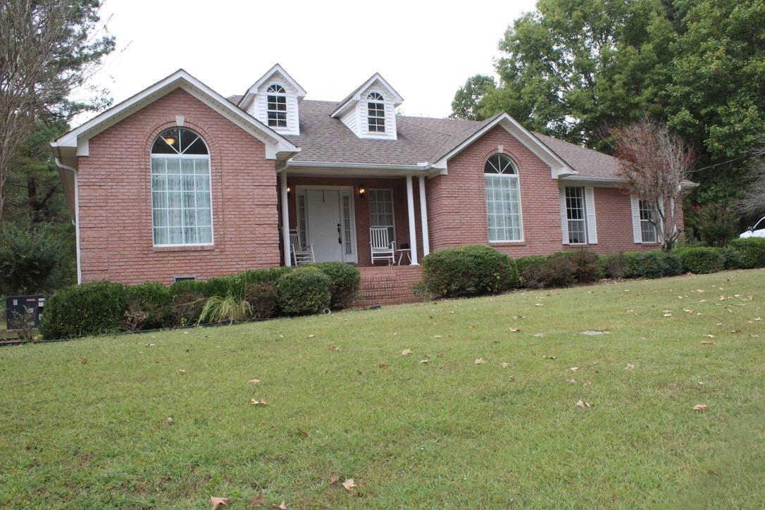 954 New Hope Road Ripley, TN 38063 - Photo 2 of 35 a front view of a house with garden