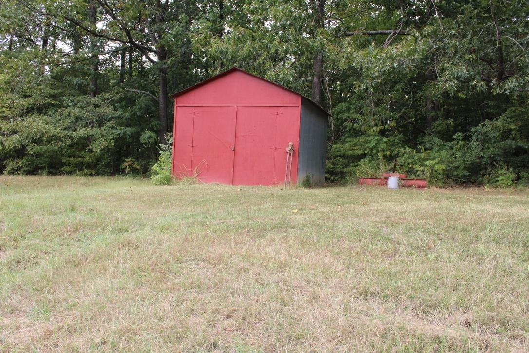 954 New Hope Road Ripley, TN 38063 - Photo 30 of 35 a view of backyard of house with green space