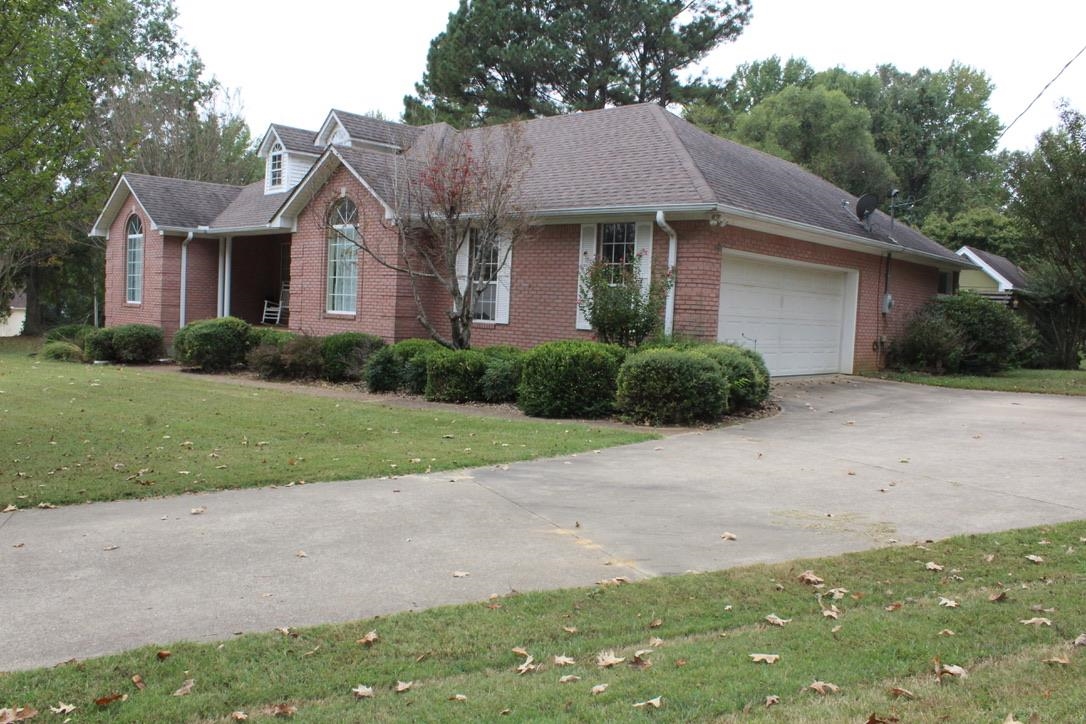 954 New Hope Road Ripley, TN 38063 - Photo 3 of 35 a front view of a house with yard and green space