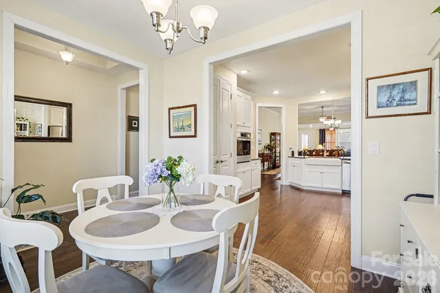 a view of house with outdoor seating area