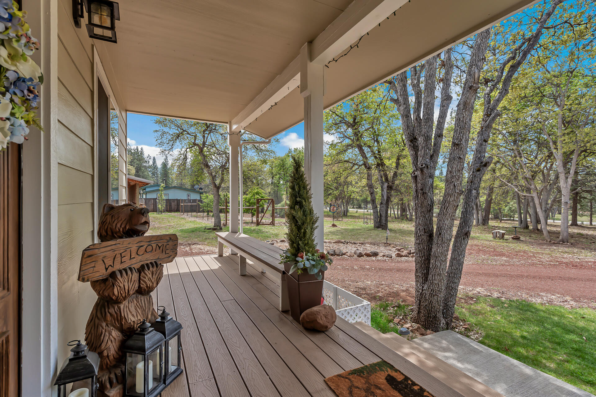 29101 Day Road McArthur, CA 96056 - Photo 11 of 48 a view of a porch with furniture and wooden floor