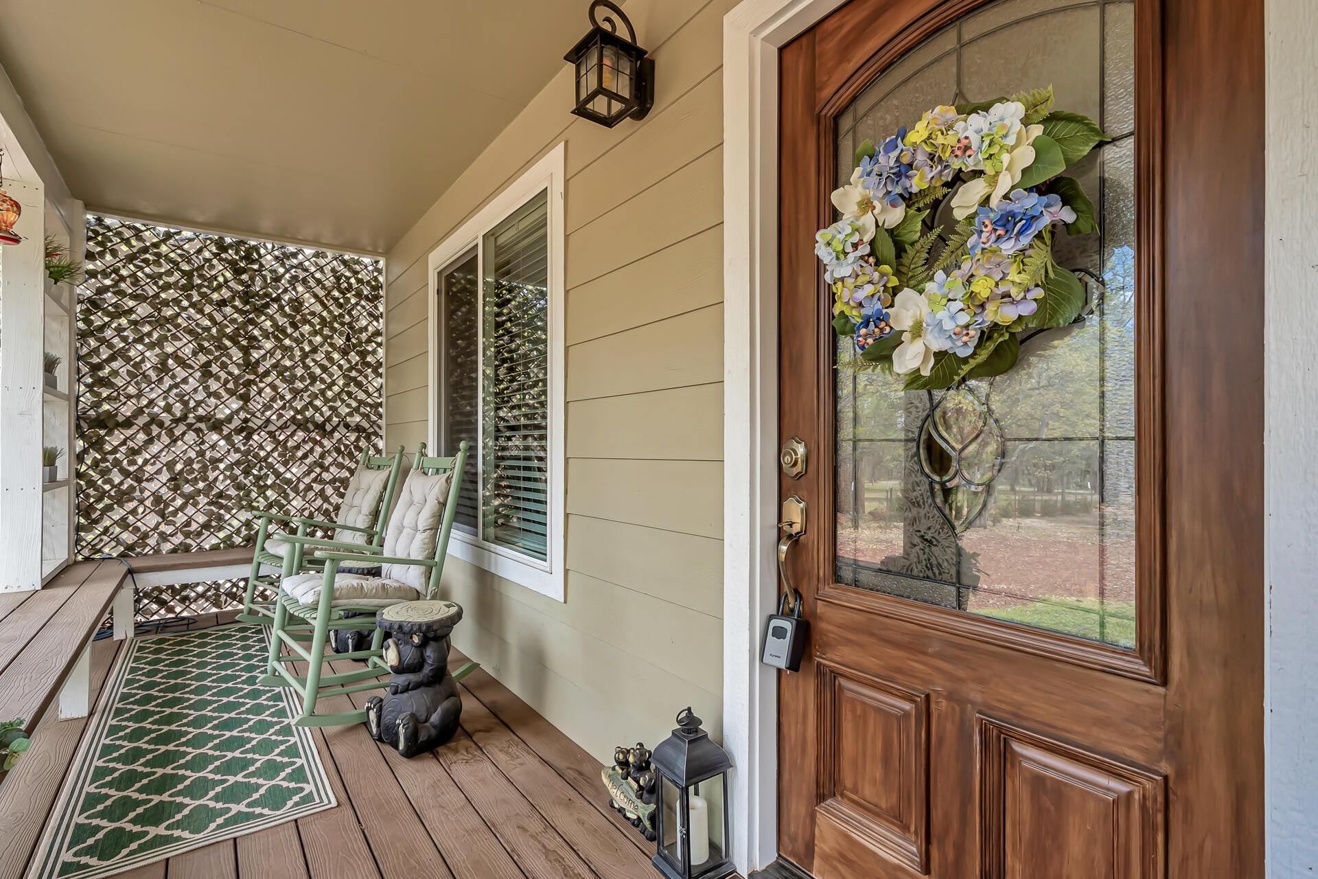 29101 Day Road McArthur, CA 96056 - Photo 12 of 48 a balcony with potted plants and wooden floor