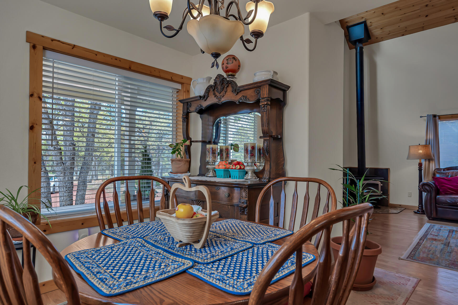 29101 Day Road McArthur, CA 96056 - Photo 21 of 48 a view of a dining room with furniture wooden floor and chandelier