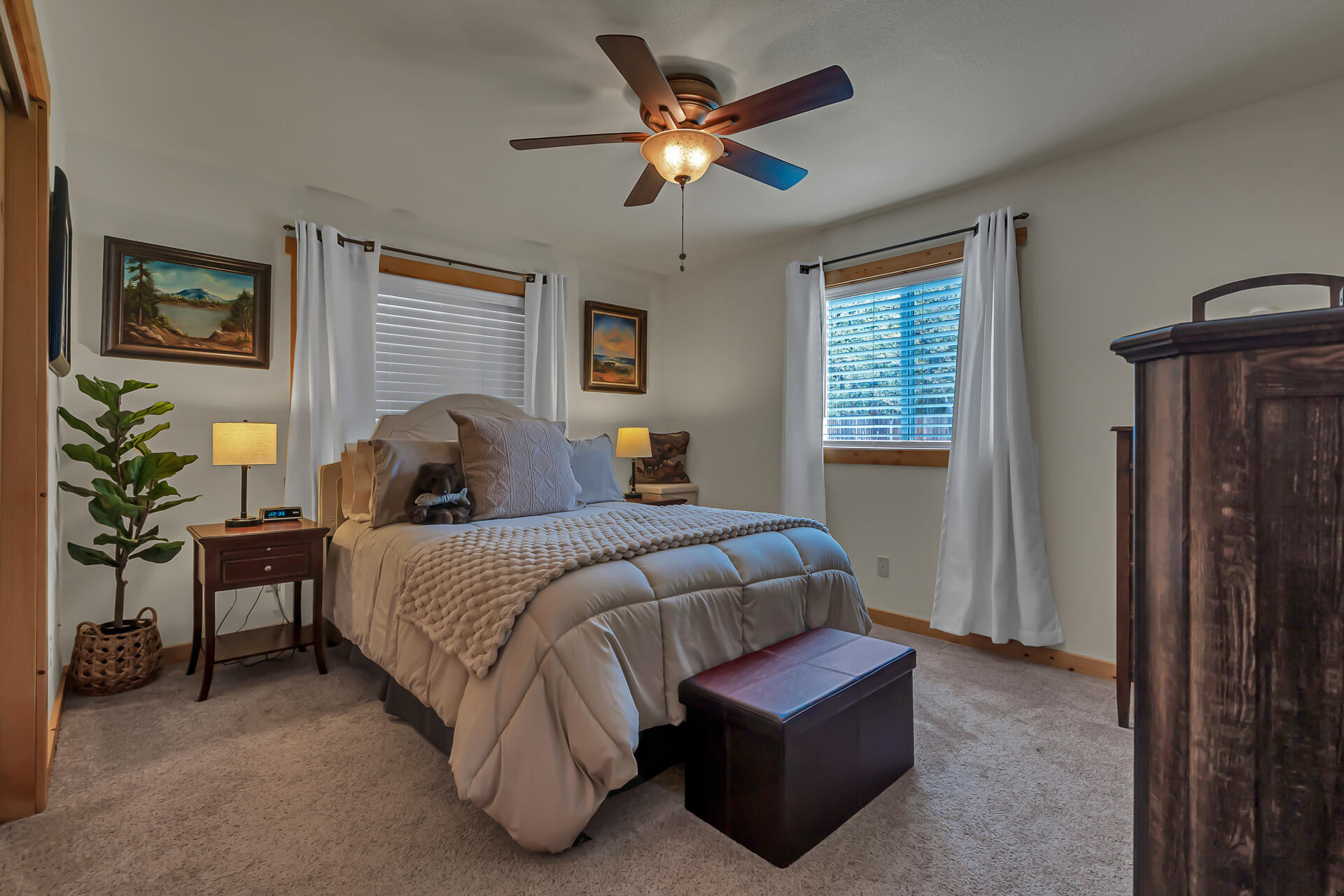29101 Day Road McArthur, CA 96056 - Photo 27 of 48 a bedroom with a bed and a chandelier