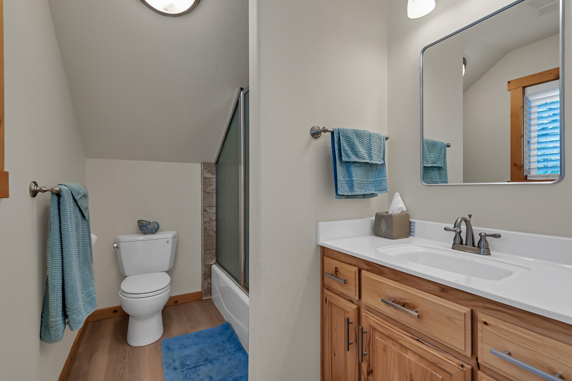 29101 Day Road McArthur, CA 96056 - Photo 29 of 48 a bathroom with a toilet sink and mirror