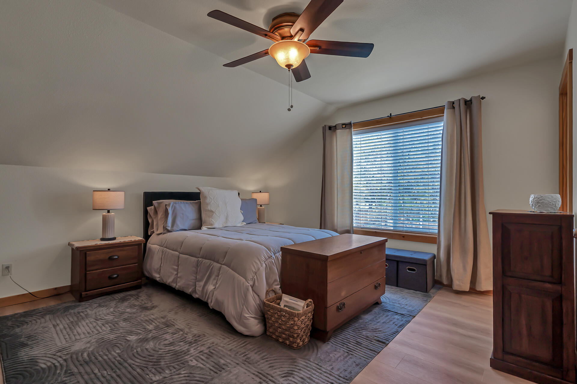 29101 Day Road McArthur, CA 96056 - Photo 32 of 48 a bedroom with a bed and a chandelier