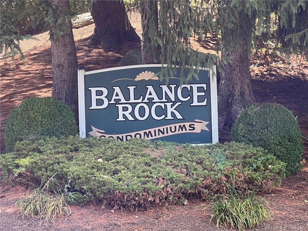 67 Balance Rock Road, Unit 14 Seymour, CT 06483 - Photo 1 of 1 a sign that is sitting next to a road
