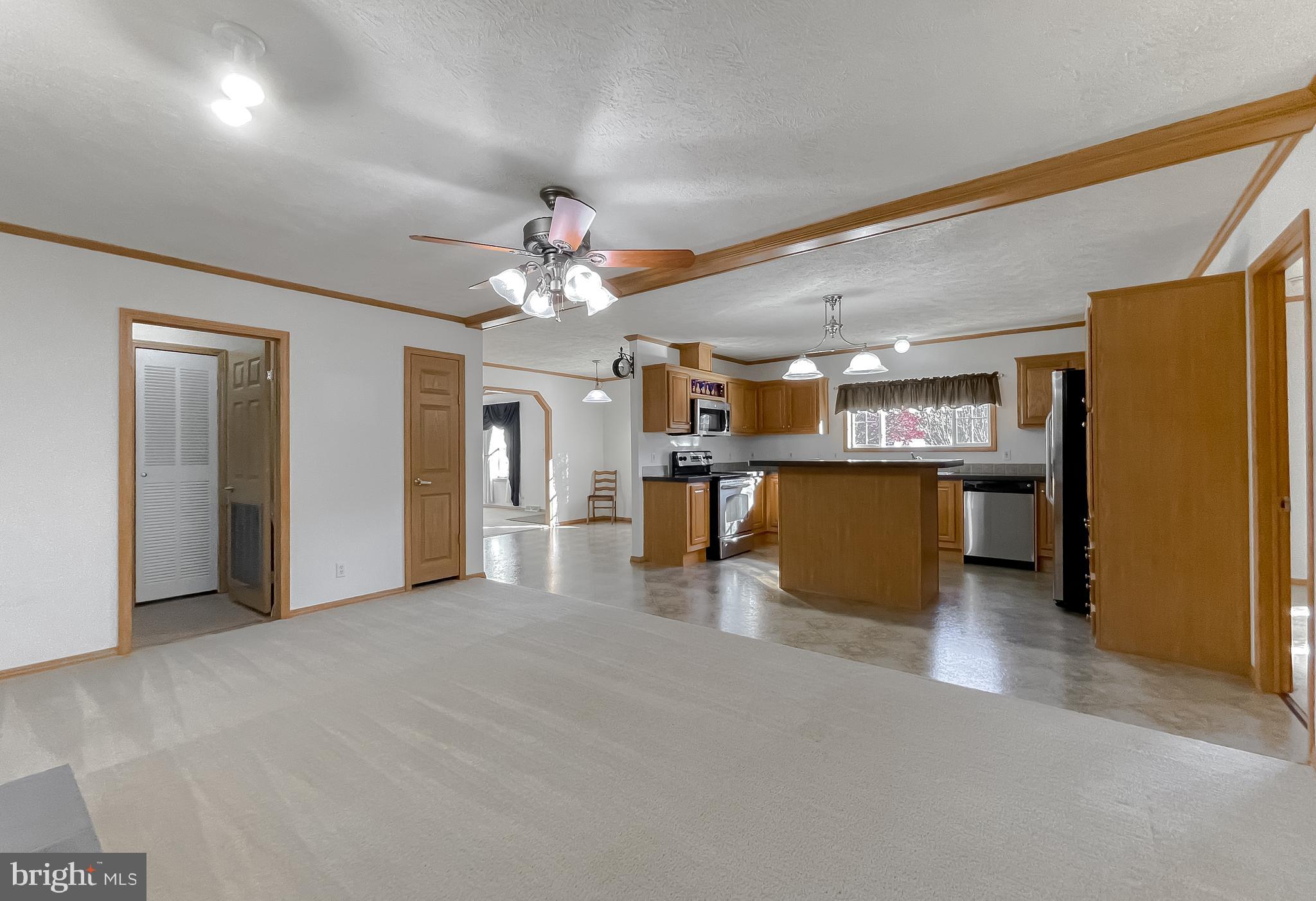 21221 Colton Point Road Avenue, MD 20609 - Photo 4 of 39 FR and kitchen combine for easy living