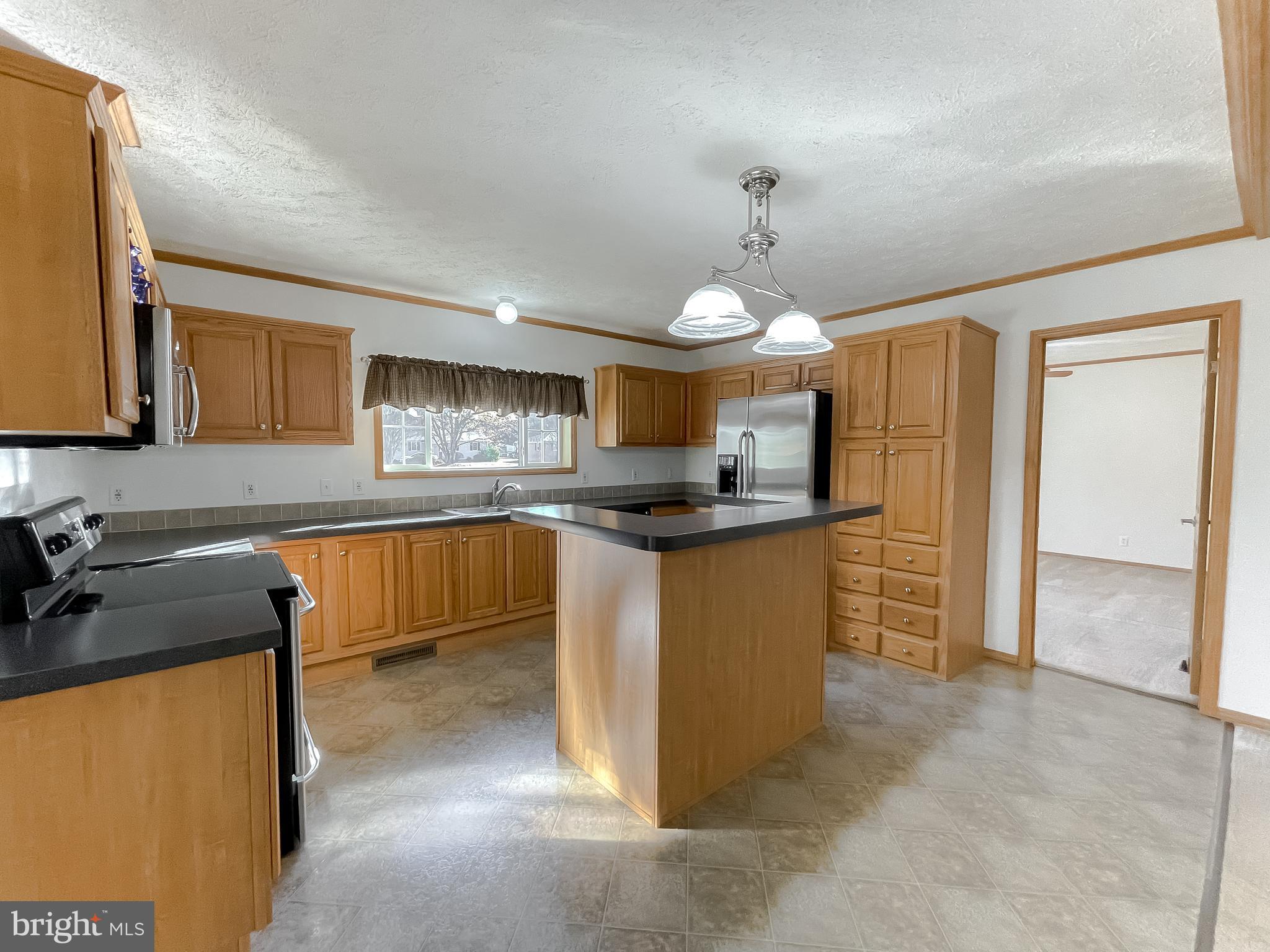 21221 Colton Point Road Avenue, MD 20609 - Photo 5 of 39 Spacious kitchen with lots of counter space