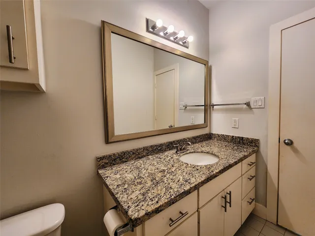 a view of a wrought iron fences in front of house