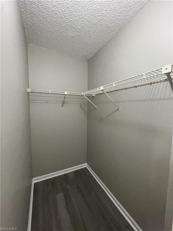 13555 Eagle Ridge Drive, Unit 925 Fort Myers, FL 33912 - Photo 7 of 15 a view of a room with racks on the wall