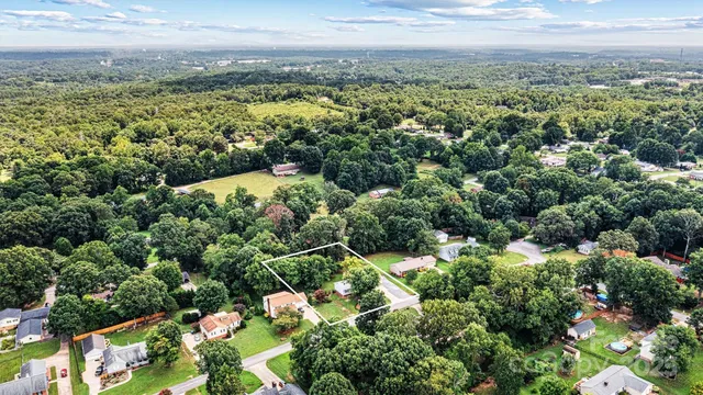 a view of a garden with an outdoor space