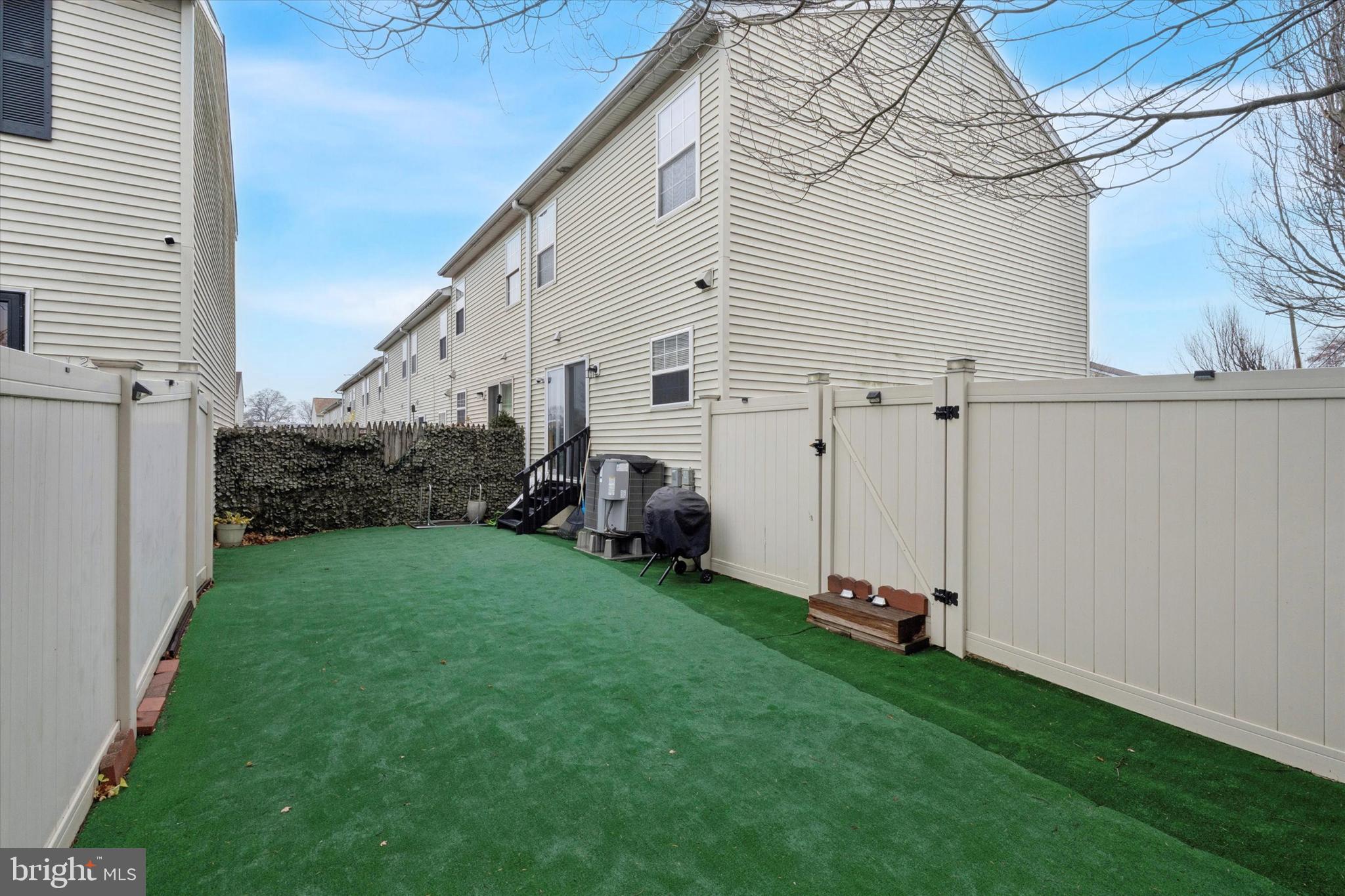 8319 Woolston Avenue Philadelphia, PA 19150 - Photo 26 of 30 a view of a back yard of the house