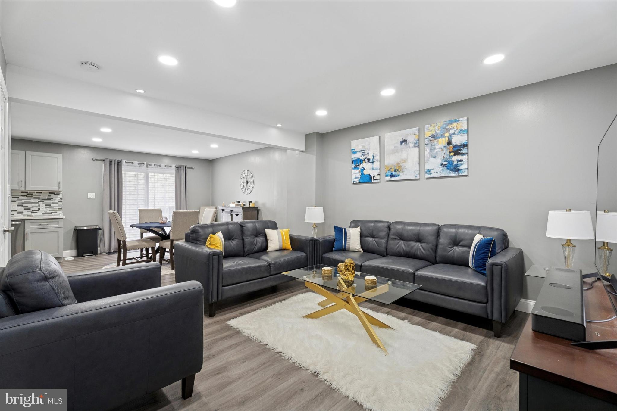 8319 Woolston Avenue Philadelphia, PA 19150 - Photo 6 of 30 a living room with furniture and a couch