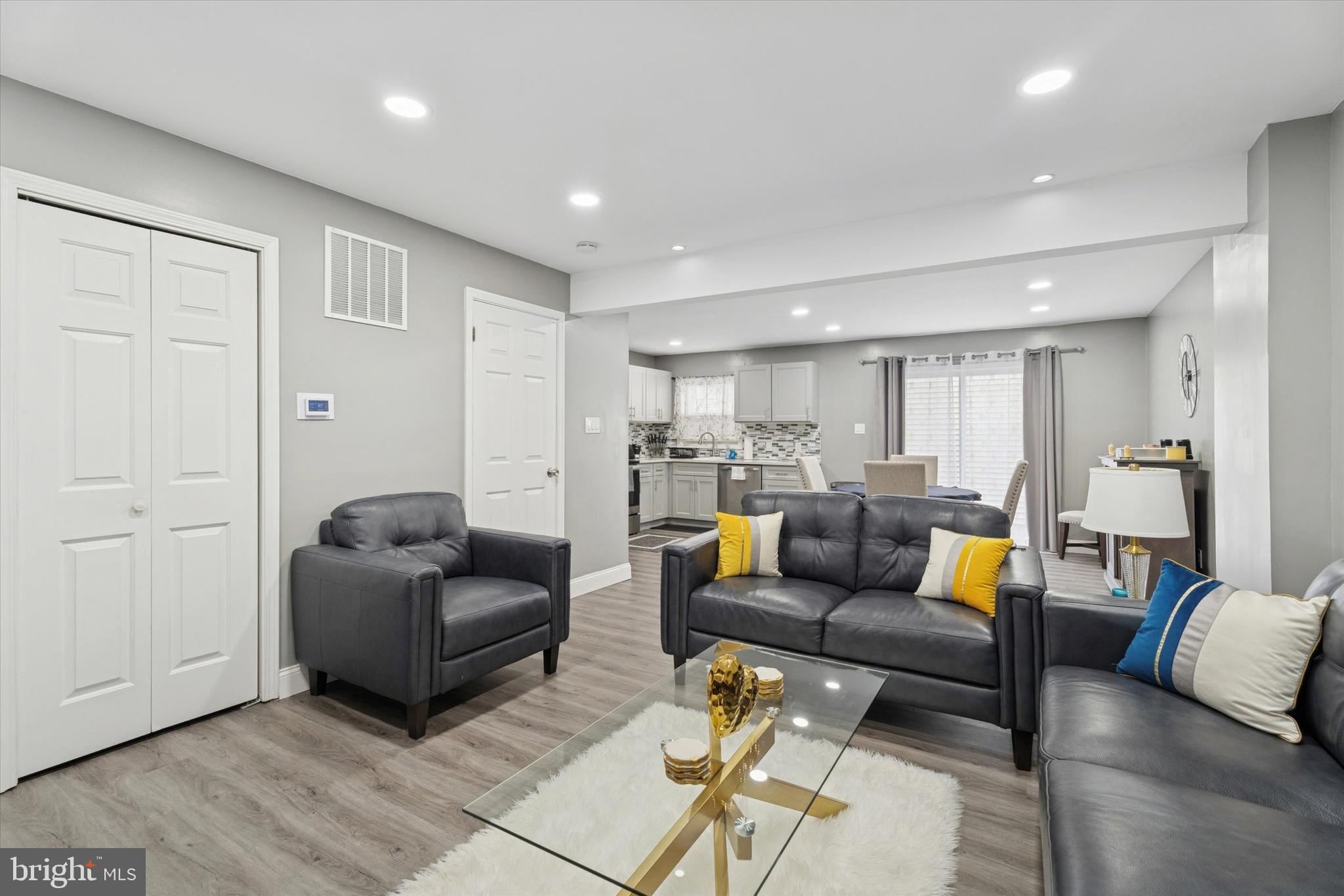 8319 Woolston Avenue Philadelphia, PA 19150 - Photo 7 of 30 a living room with furniture and a wooden floor