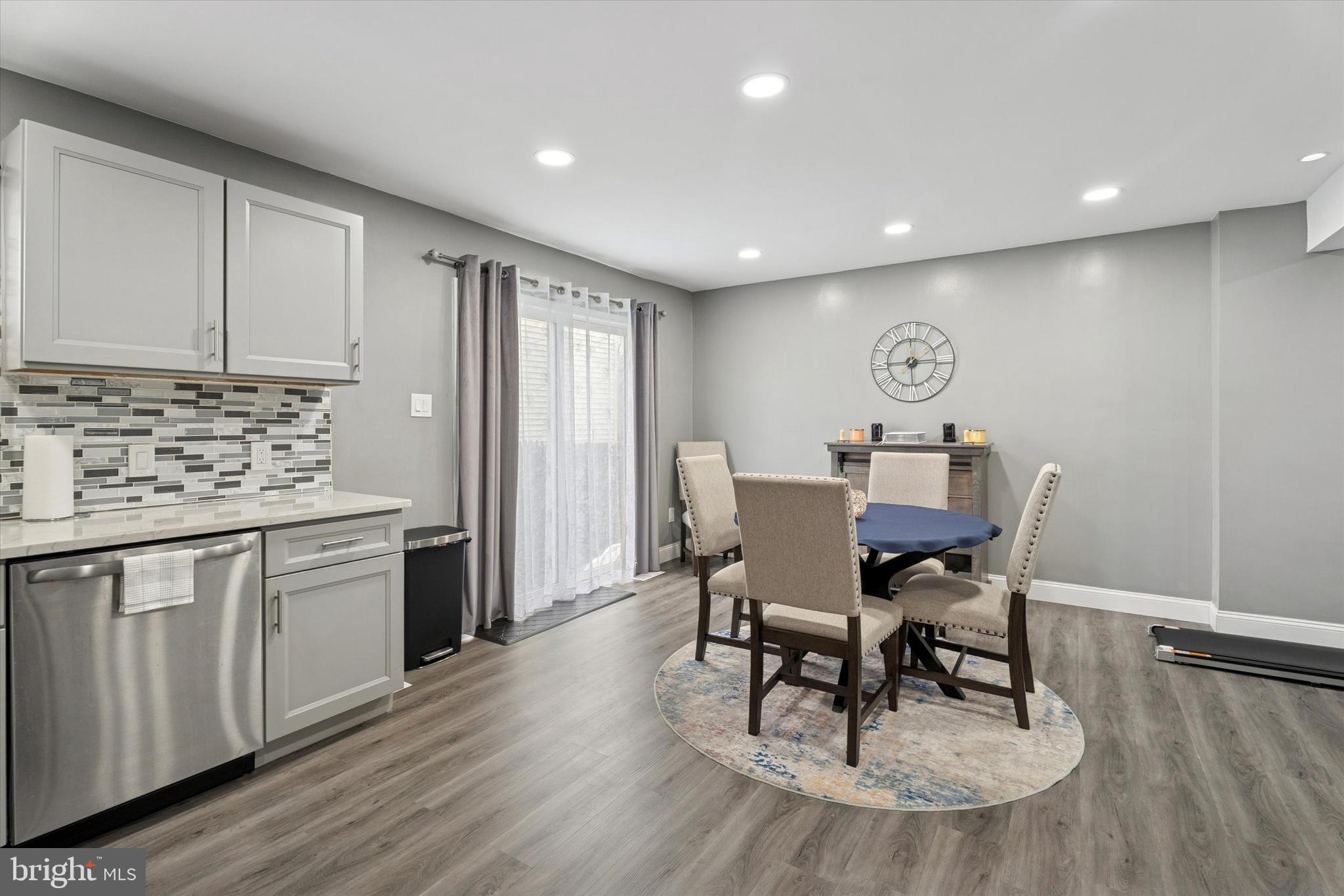 8319 Woolston Avenue Philadelphia, PA 19150 - Photo 10 of 30 a view of a dining room with furniture and wooden floor