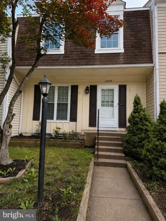 front view of a house with yard