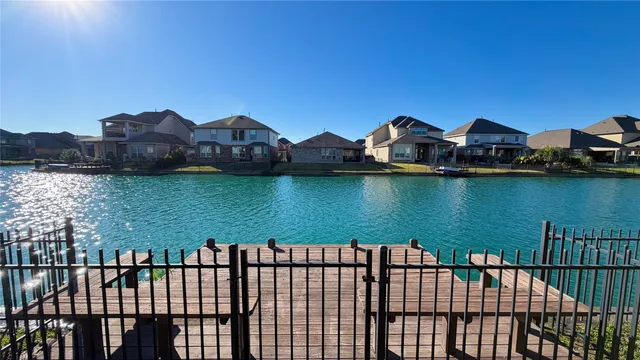 a view of swimming pool with a lake view