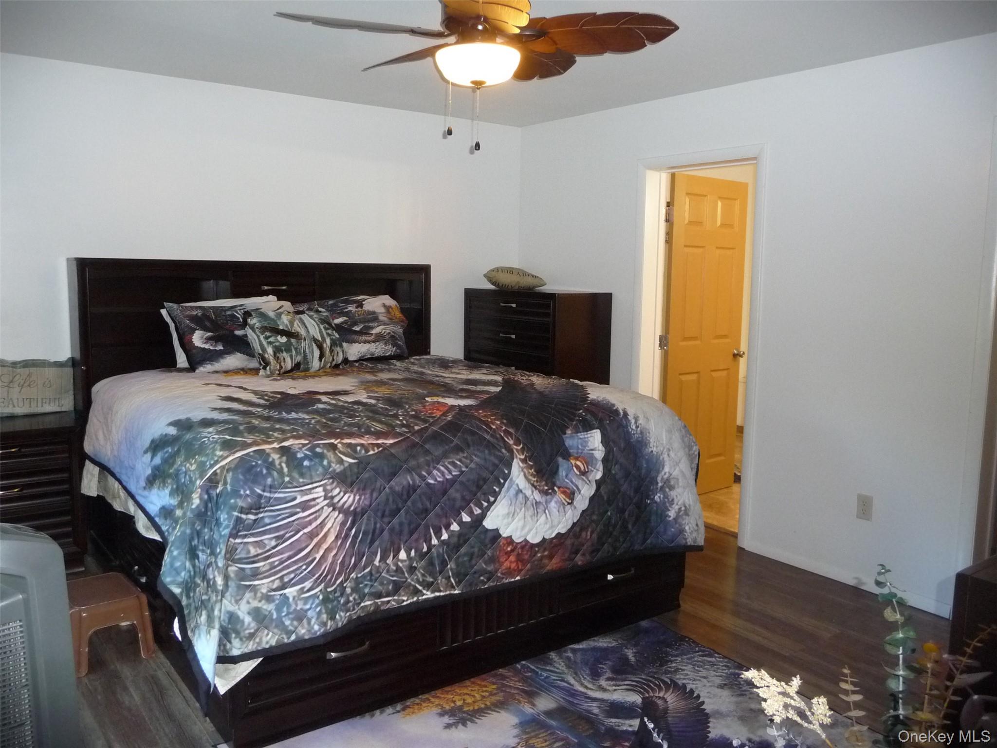 173 Franke Road Huguenot, NY 12746 - Photo 15 of 39 a bed sitting in a bedroom next to a window