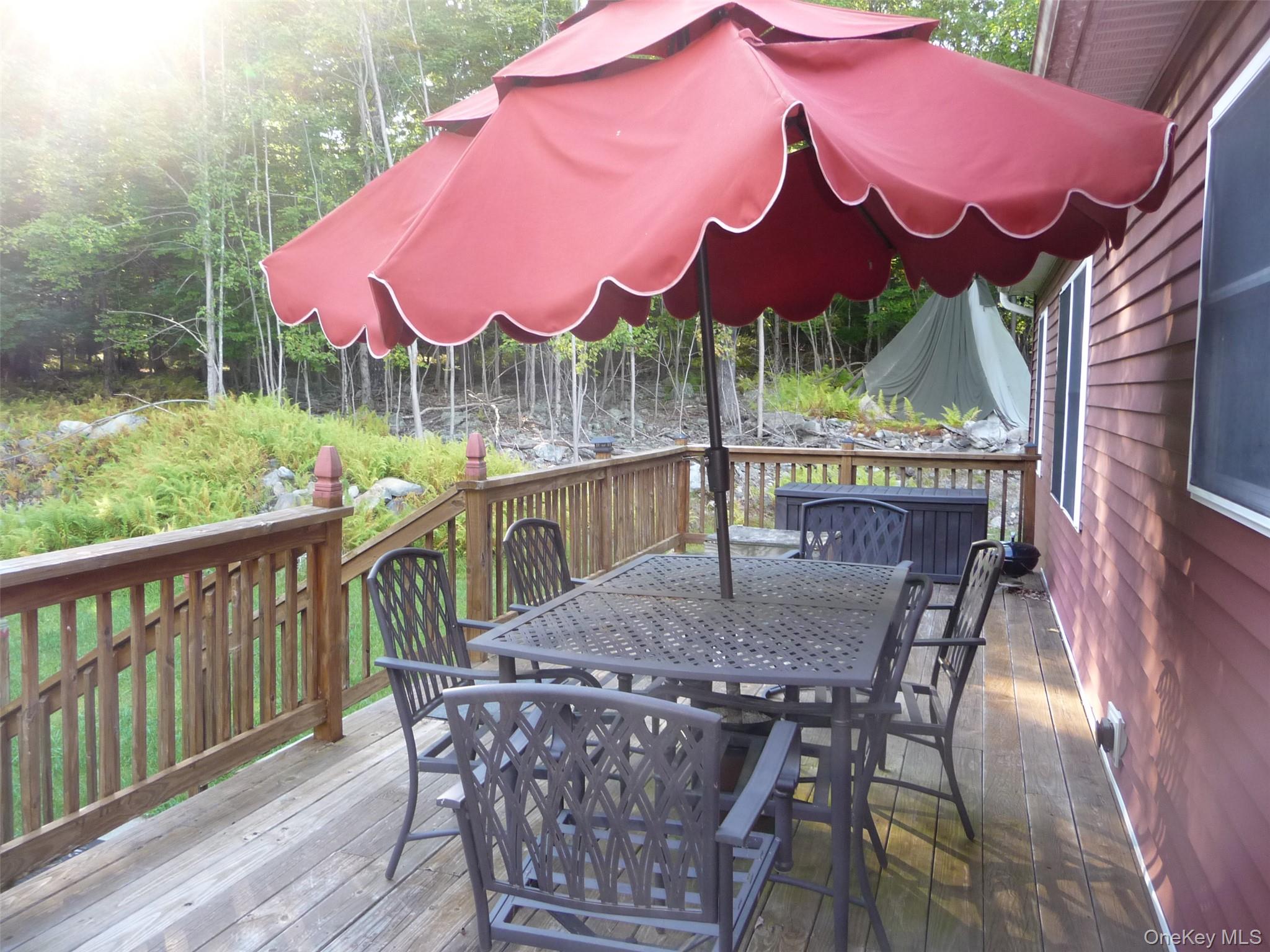 173 Franke Road Huguenot, NY 12746 - Photo 21 of 39 a view of house with a table and chairs