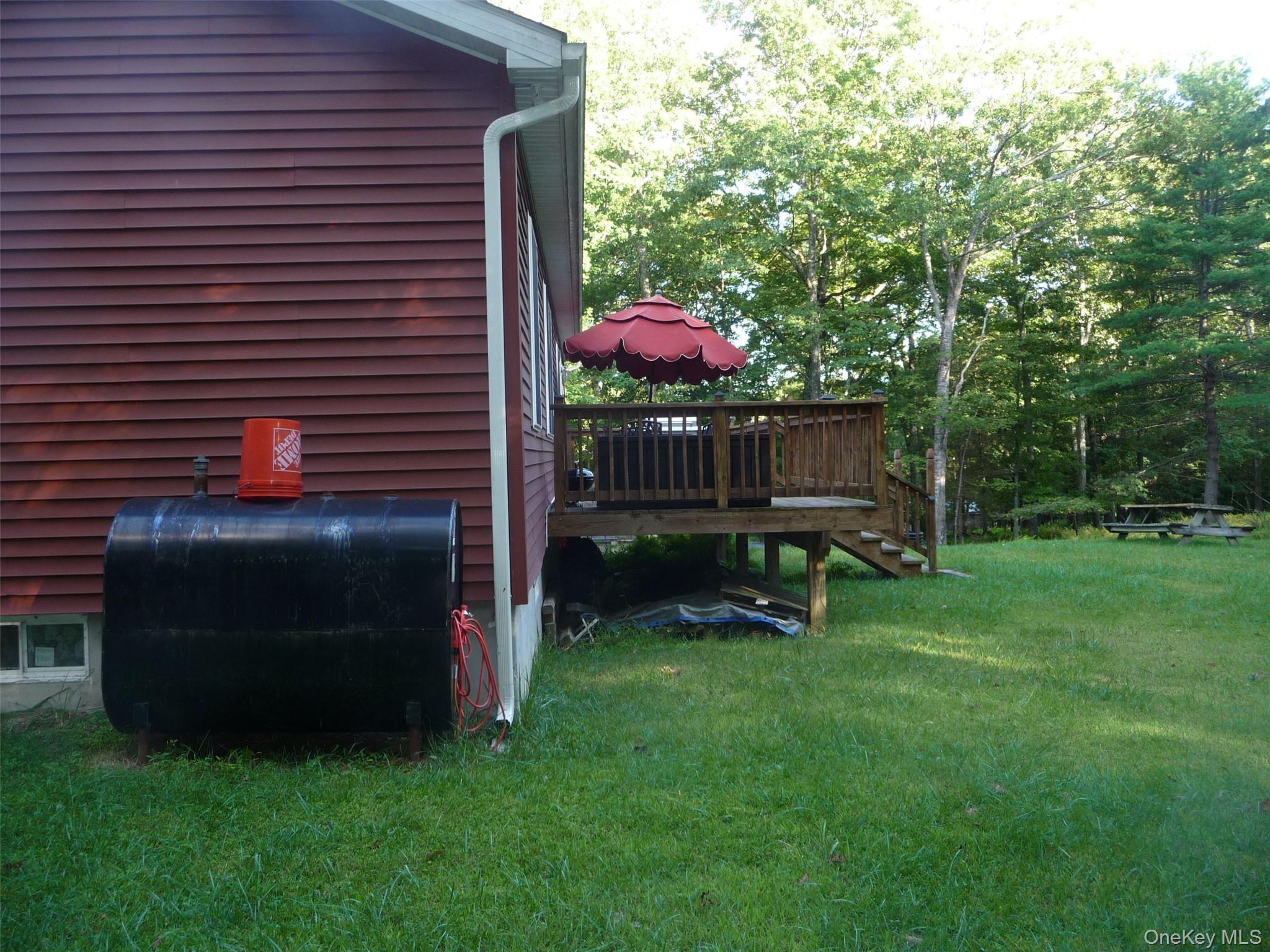 173 Franke Road Huguenot, NY 12746 - Photo 38 of 39 a view of a house with a backyard