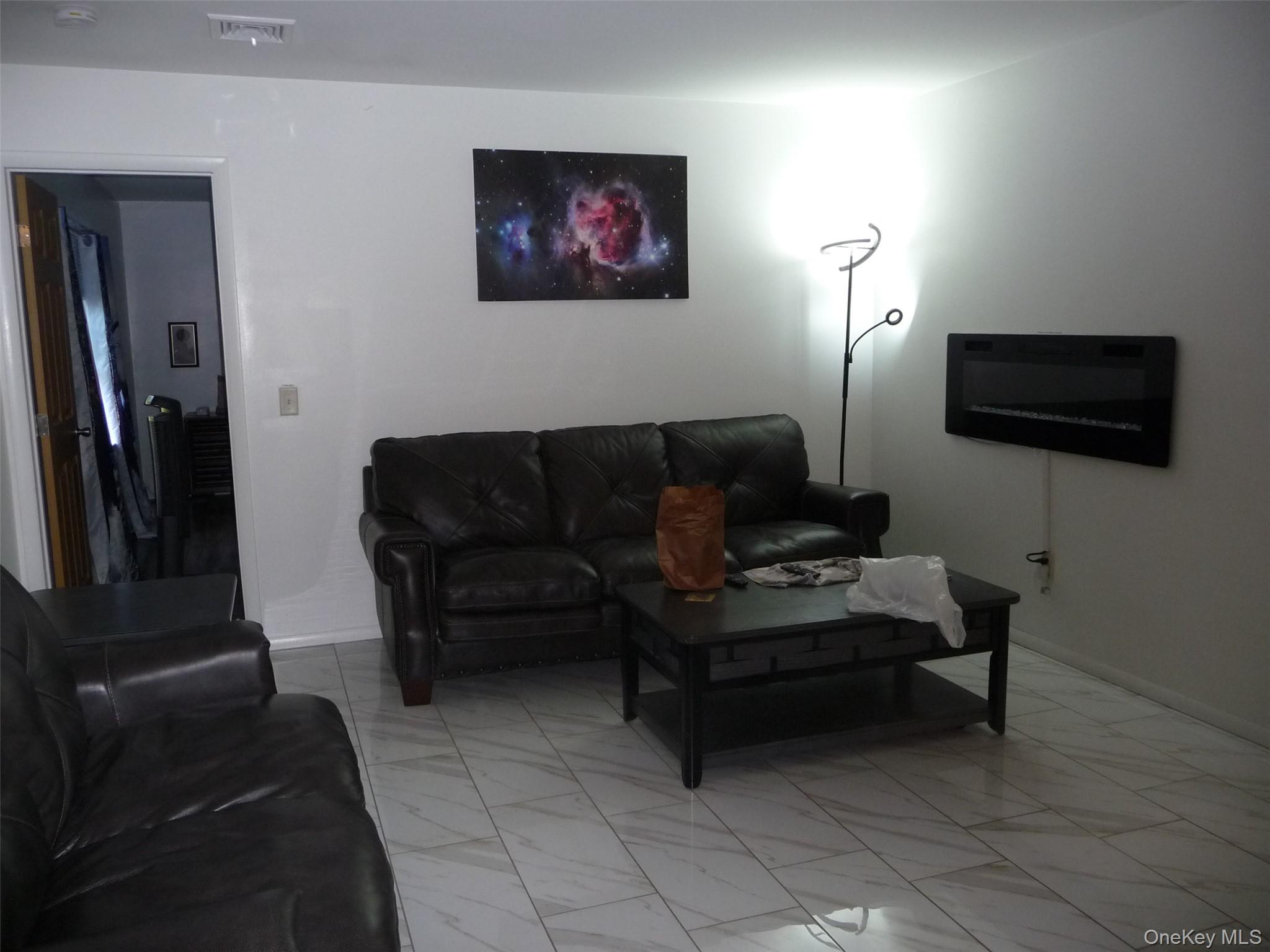 173 Franke Road Huguenot, NY 12746 - Photo 8 of 39 a living room with furniture and a flat screen tv