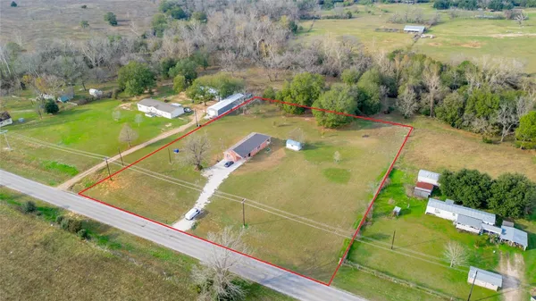 a view of a pool yard and lake view