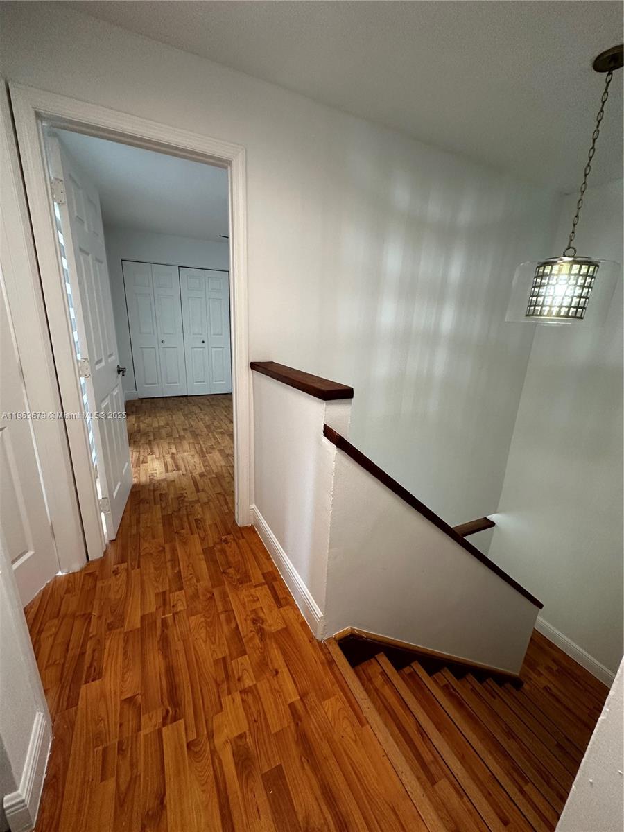 13440 Southwest 62nd Street, Unit G101 Miami, FL 33183 - Photo 19 of 23 a view of wooden floor