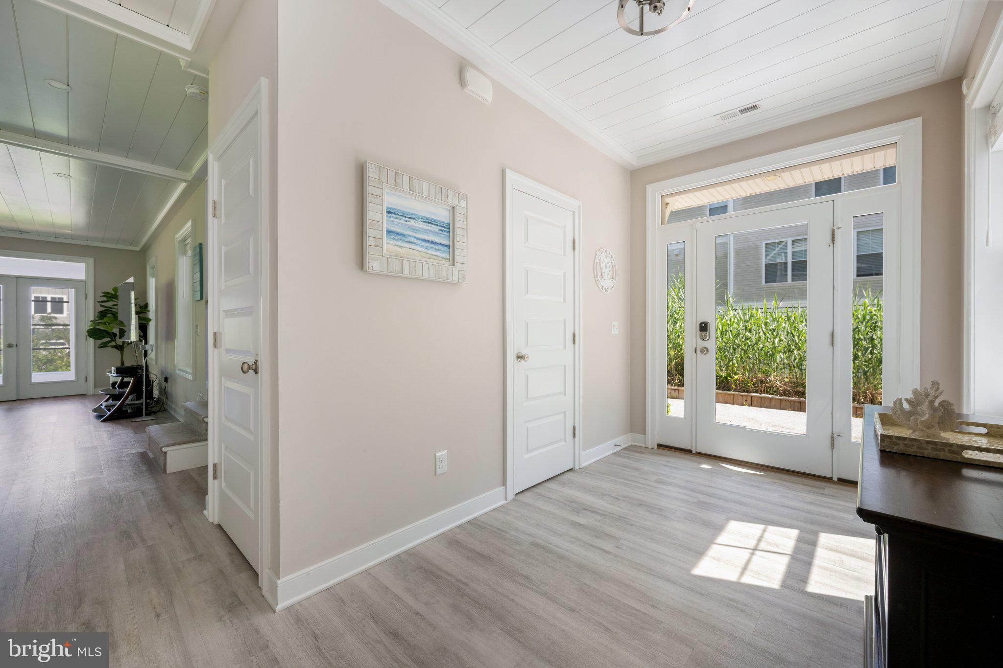 402 Salt Pond Road Bethany Beach, DE 19930 - Photo 21 of 55 Bright entryway with welcoming light.