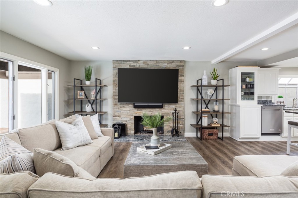2789 Waxwing Circle Costa Mesa, CA 92626 - Photo 15 of 47 a living room with furniture and a flat screen tv