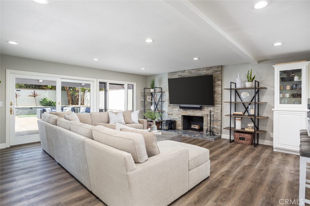 2789 Waxwing Circle Costa Mesa, CA 92626 - Photo 16 of 47 a living room with fireplace furniture and a flat screen tv