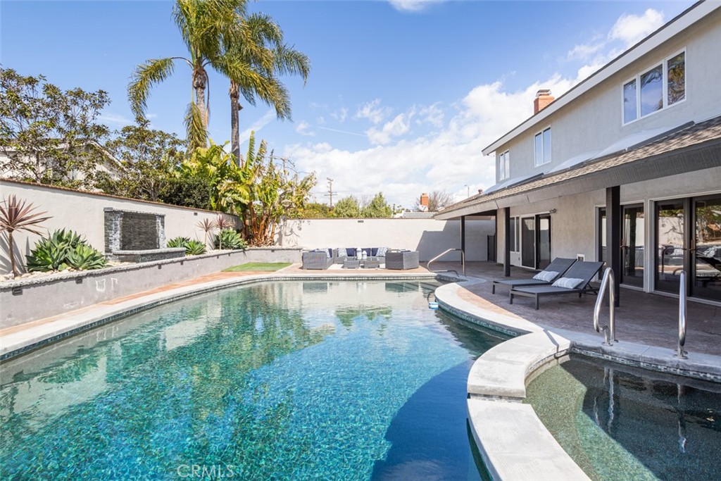 2789 Waxwing Circle Costa Mesa, CA 92626 - Photo 17 of 47 a swimming pool with outdoor seating and yard