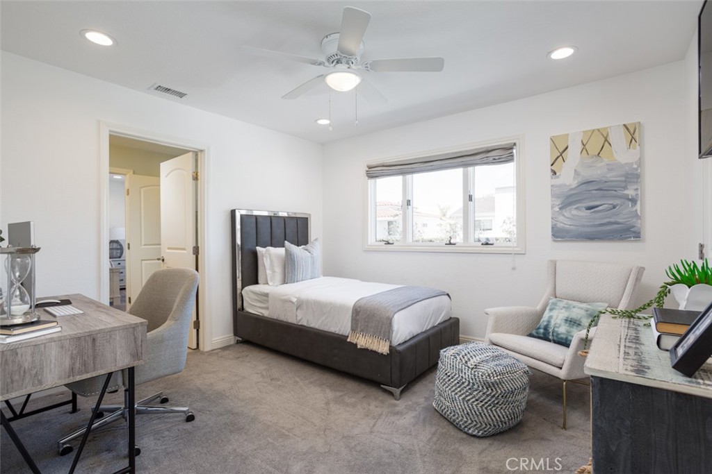 2789 Waxwing Circle Costa Mesa, CA 92626 - Photo 31 of 47 a spacious bedroom with two beds and a couch