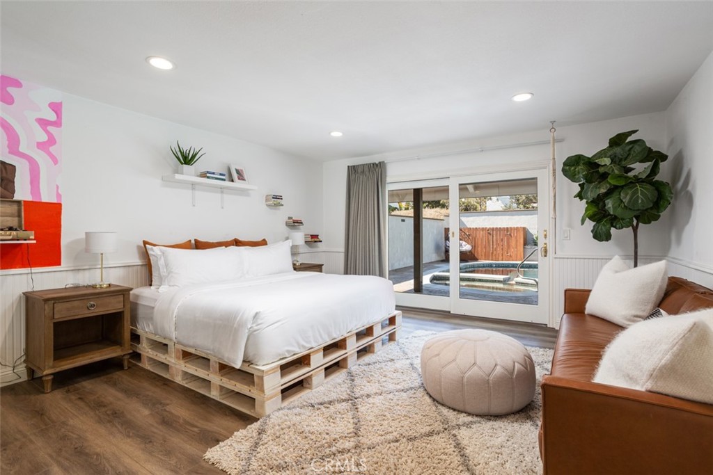 2789 Waxwing Circle Costa Mesa, CA 92626 - Photo 34 of 47 a bedroom with furniture and a fireplace