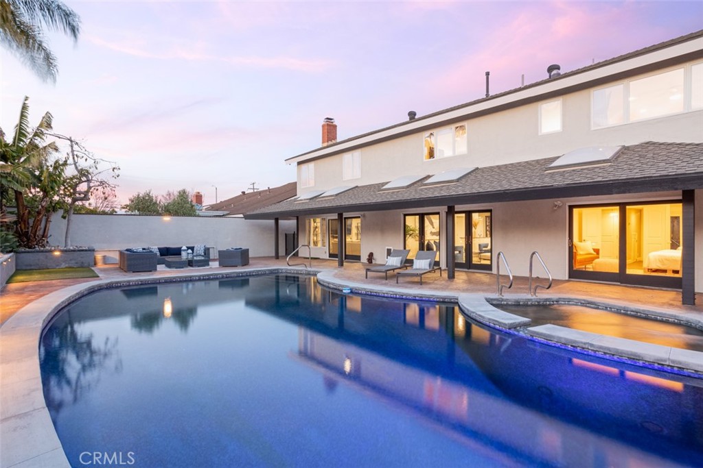 2789 Waxwing Circle Costa Mesa, CA 92626 - Photo 42 of 47 a view of a swimming pool with a patio