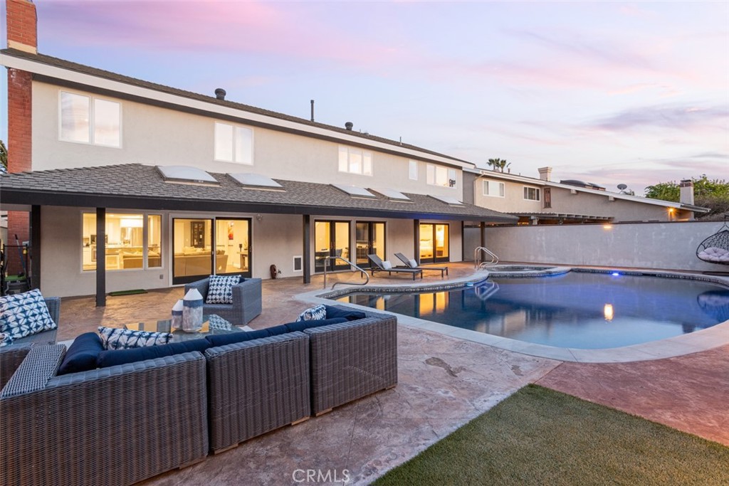 2789 Waxwing Circle Costa Mesa, CA 92626 - Photo 43 of 47 a view of a swimming pool with a patio
