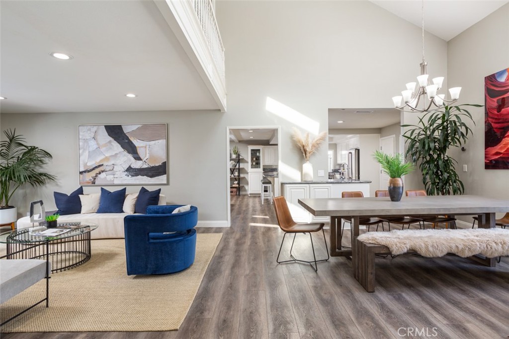 2789 Waxwing Circle Costa Mesa, CA 92626 - Photo 5 of 47 a living room with furniture kitchen view and a potted plant